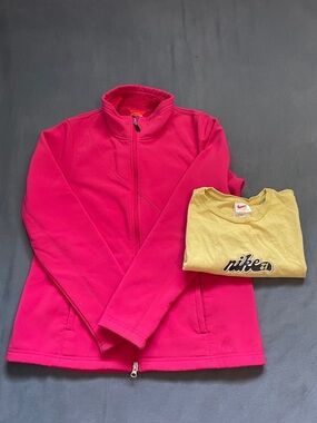 Pink Nike zip up jacket and white tee